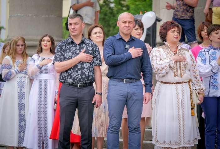 новини